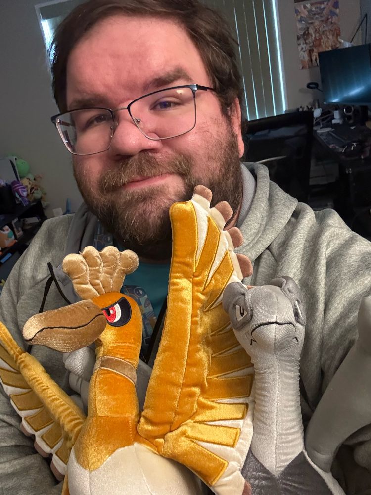 Me and the 25th anniversary shiny plushies of Lugia and Ho-Oh