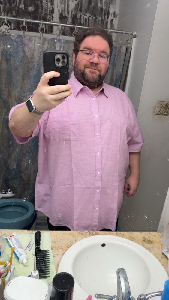 New shirt. It’s a pink button up shirt.