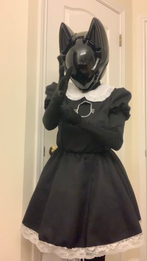 2546 adjusting the arm sleeves of its suit