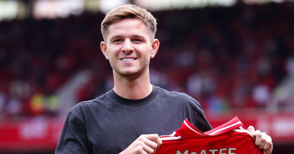 James McAtee pictured signing for Forest with disgraced agent jailed for 9 years
