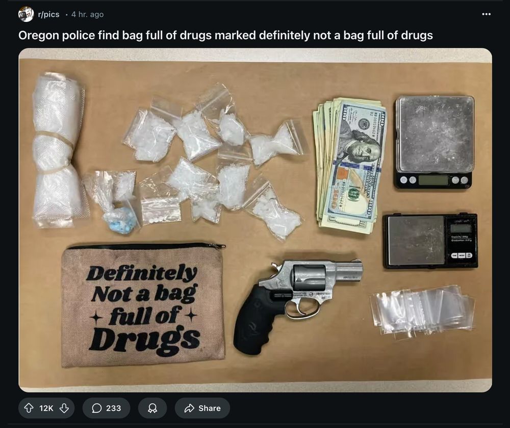 A screenshot of a Reddit post. The title is "Oregon Police Find Bag Full of Drugs Marked 'Definitely Not a Bag Full of Drugs" above a photo of a police seizure lay-flat including multiple bags of drugs, a stack of cash, a handgun, and a cute zipper pouch with a trendy Etsy-style lettering design on the front that says "Definitely not a bag ✨full of✨ Drugs"
