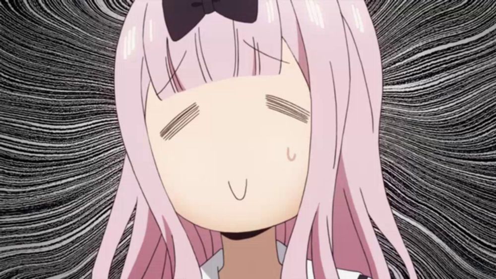 a girl with pink hair and a bow on her head is making a funny face