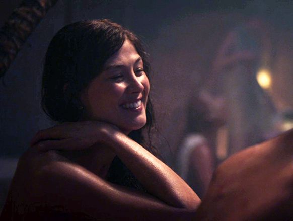 Moiraine Sedai smiling at her warder, Lan Mandragoran, in The Wheel of Time season 3.