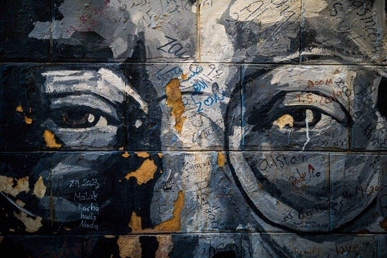 The eyes of Mahmoud Darwish look on in a mural seen on a wall in downtown Amman, Jordan, on Jan. 5. The late Palestinian author, who died in 2008, was regarded as Palestine's national poet.Natascha Tahabsem—Zuma Press