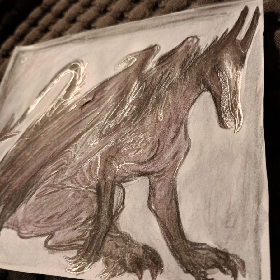 the same drawing at an angle that shows bright silvery outlines in normal graphite over the other colors which is otherwise unseen.