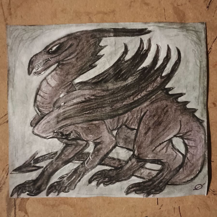 photo of a drawing of a dragon in charcoal pencil with purple and inky black watercolor pencil coloring, bright shining silvery graphite outlining is visible in a few places from the lighting