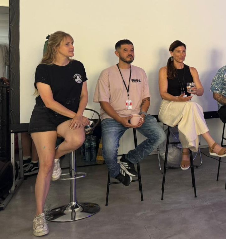 Panel of speakers featuring mural artists Jen Miller and Otom alongside Monterey Bay Aquarium’s vice president of Global Ocean Conservation, Jennifer Dianto Kemmerly.
