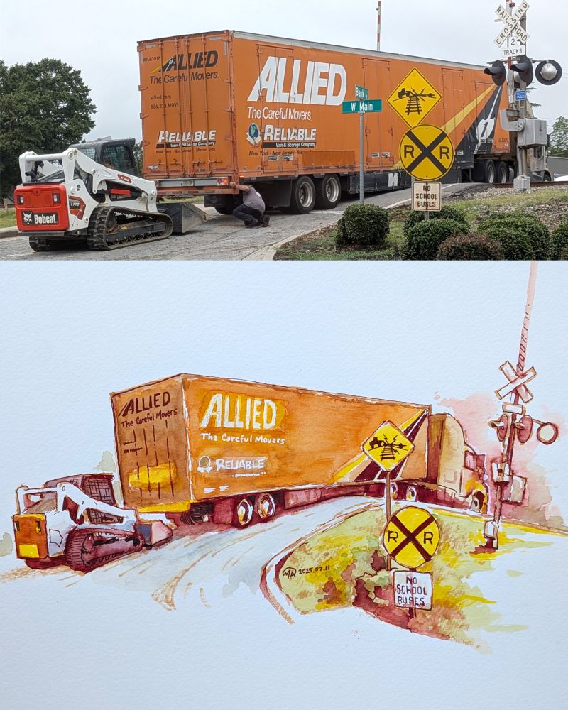 A semi-trailer truck is stuck on a railroad crossing behind the signage saying exactly what will happen if one drives a large trailer over the tracks. A compact track loader attempts to free the large vehicle.