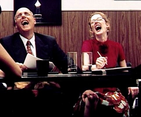 George Bluth Sr and his assistant Kitty making the same expression together 