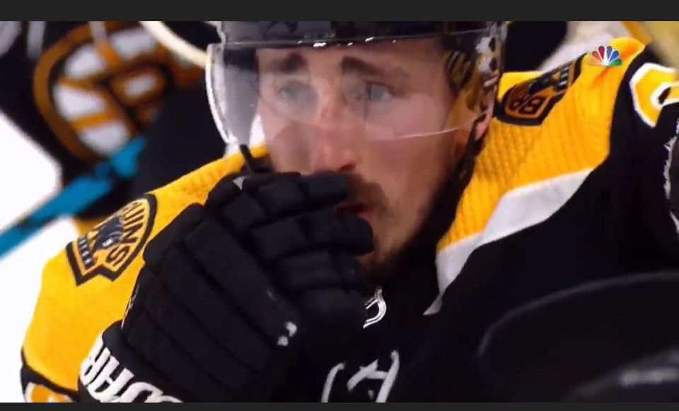 Brad Marchand with tears in his eyes after a Bruins loss