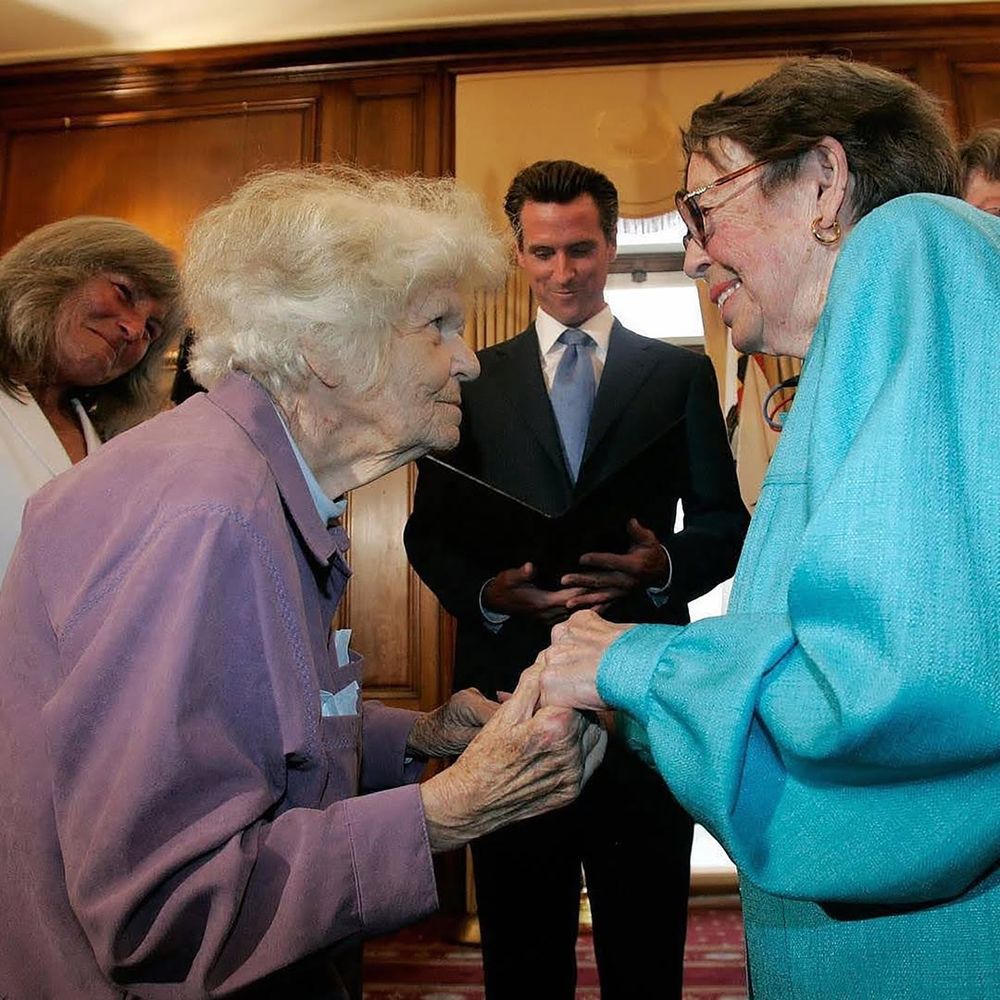 Del Martin (left) and Phyllis Lyon with Mayor Gavin Newsom (center) at San Francisco City Hall, June 16, 2008. Credit: Marcio Jose Sanchez/AFP via Getty Images