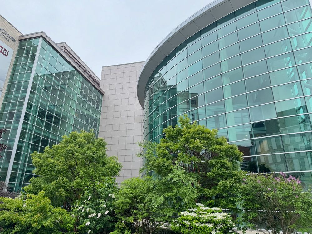 Exterior view of McMaster's MDCL building with gardens in the foreground.