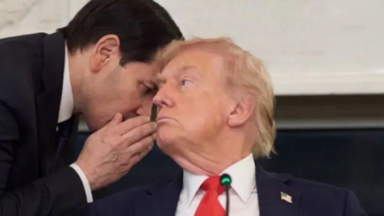 Marco Rubio whispering to Tr*mp. 