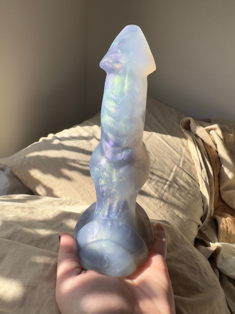 A small blue-purple colorshift Dragon from The Wandering Bard