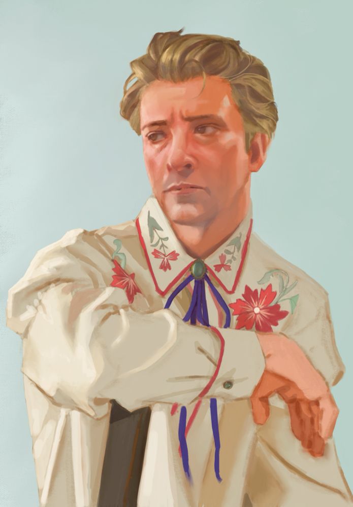 Portrait of a Western AU Stede wearing western formal wear. He looks off to one side and stands slightly hunched as his arm rests on a wooden post. His white shirt is decorated with reddish pink and green floral embroidery, and the same pink lining on his collar, sleeve, and near the button closures of his shirt. He has a turquoise antique broach with a long, thin cobalt blue tie knotted into a bow at his collar, along with a matching turquoise cufflink on his sleeve. His hair is slicked back and a bit windswept. 