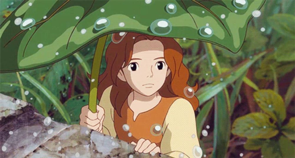 a cartoon girl is holding an umbrella under a green leaf