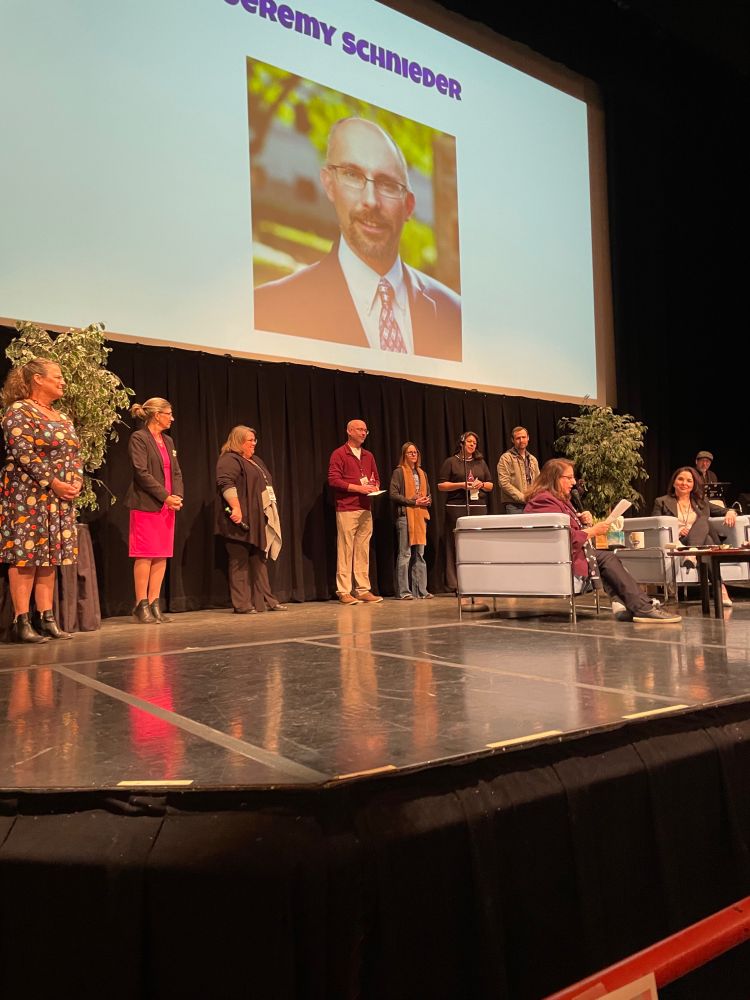 Jeremy standing with the other award winners at Pima College’s All Faculty Day. 
