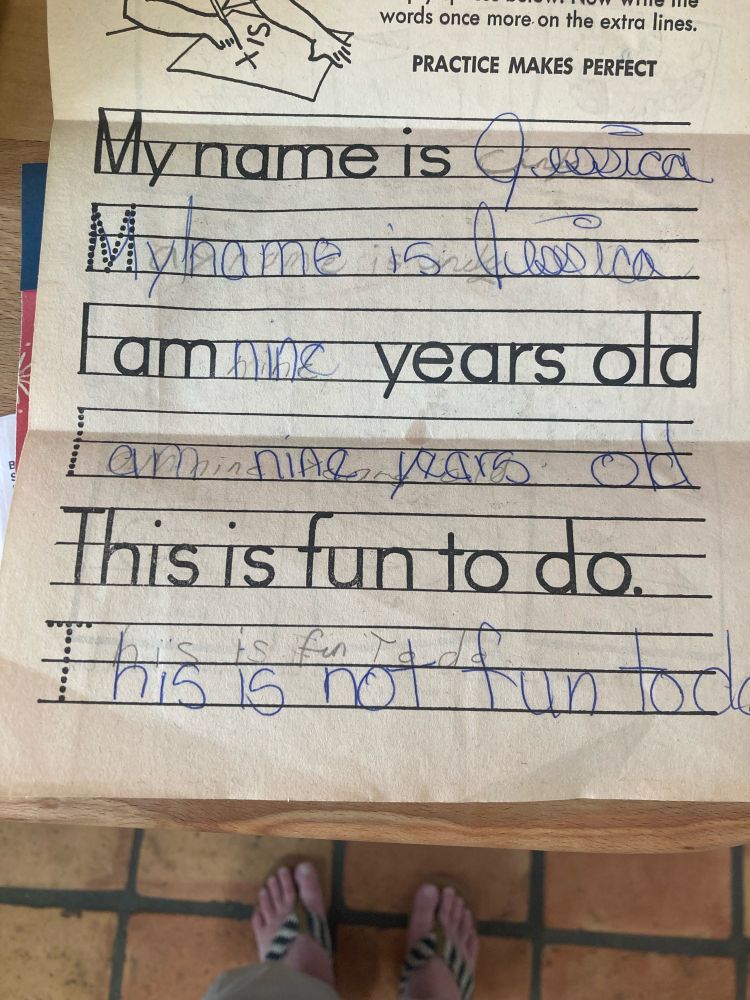A workbook page for practicing writing. The prompt line is followed by an empty line for the student write the same sentence over again on their own. On the final two lines, the prompt line is followed by”This is fun to do.” But I wrote “This is NOT fun to do” below it because you can not tell nine year old Jessica what to do, workbook page!