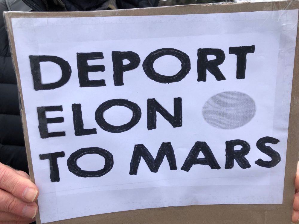 Protest sign that states: Deport Elon to Mars. 