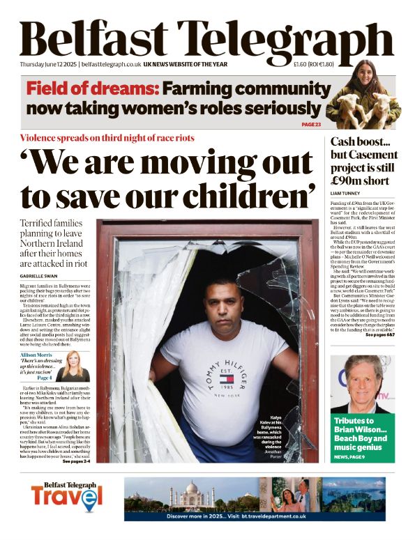 Belfast Telegraph headline reading "We are Moving out to save our children" above an image of a man in front of a broken window