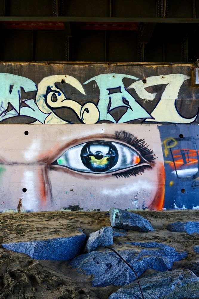 Graffiti and rocks and sand