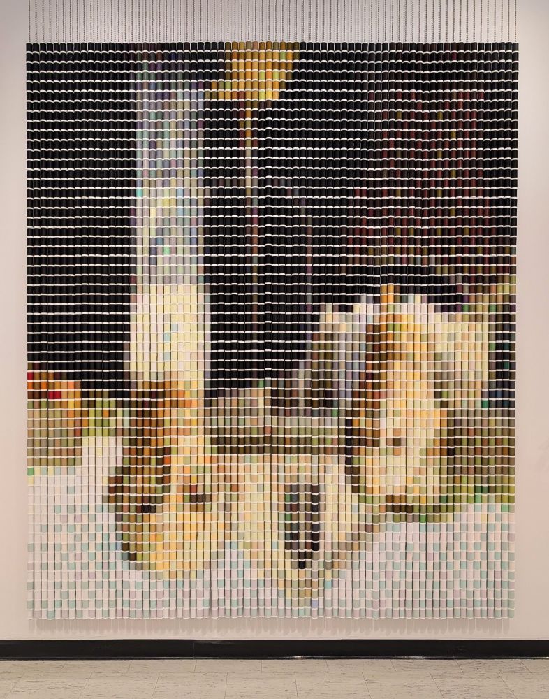 American Gothic upside down in spools of thread 