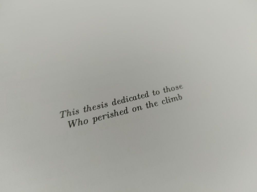 A mostly blank page, with just two lines set in the center: 

This thesis dedicated to those
Who perished on the climb