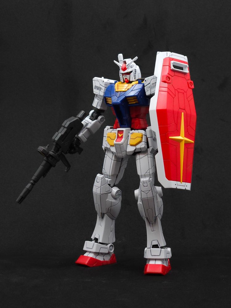 Gundam standing, holding beam rifle and shield