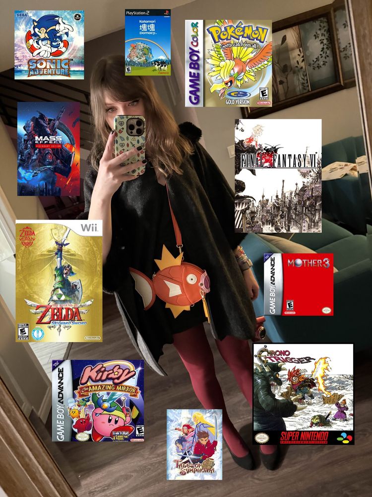 A mirror selfie with the box art for 10 games: pokemon gold, mass effect legendary edition, final fantasy vi, kirby and the amazing mirror, tales of symphonia, chrono trigger, Zelda skyward sword, katamari damacy, sonic adventure, mother 3
