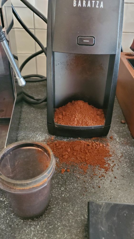 A pile of fresh ground coffee mounds up below the coffee grinder and all over the counter. The container thats supposed to catch the coffee was never placed to catch coffee and sits right next to the machine. Now theres a mess to clean and still no coffee. 