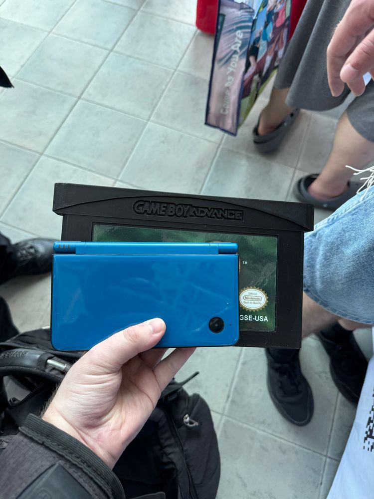 DSi XL with a comically oversized facsimile of Golden Sun