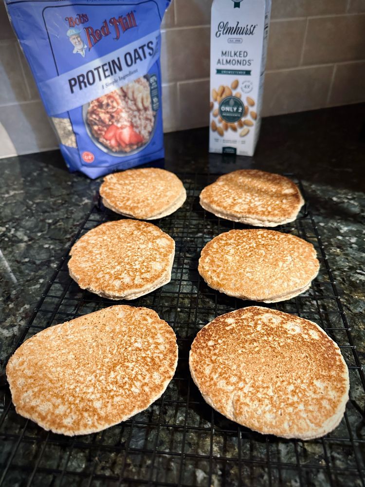 Six pancakes on cooling rack 