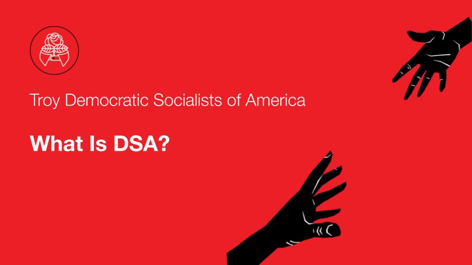 White text: Troy Democratic Socialists of America : What is DSA?
On a red background. Two illustrated hands in black extending towards one another.