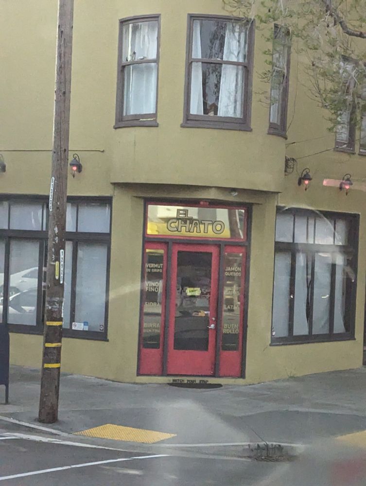 doorway of some kind of restaurant(?) with a sign EL CHATO over it