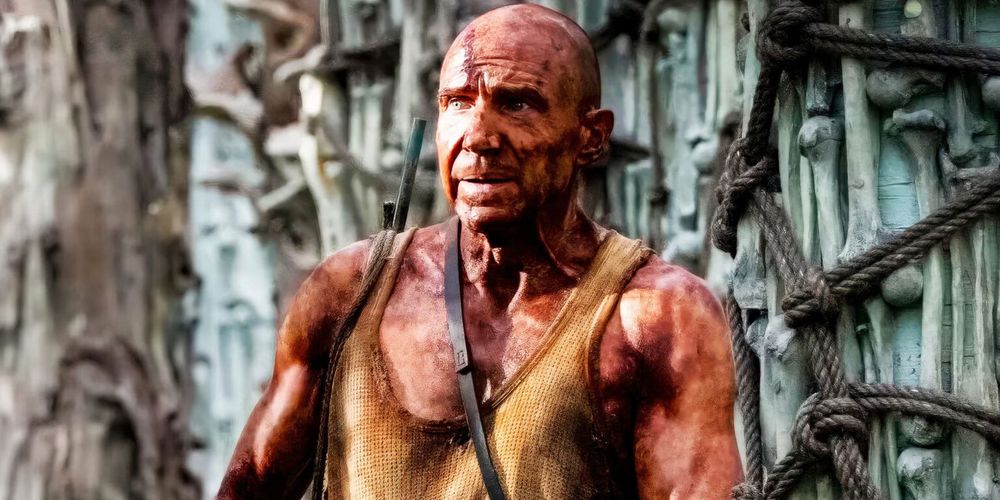 A very orange Ralf Fiennes in 28 Years Later. He's bald headed, smeared in iodine, wearing a yellowed tank top. Sartorial goals!