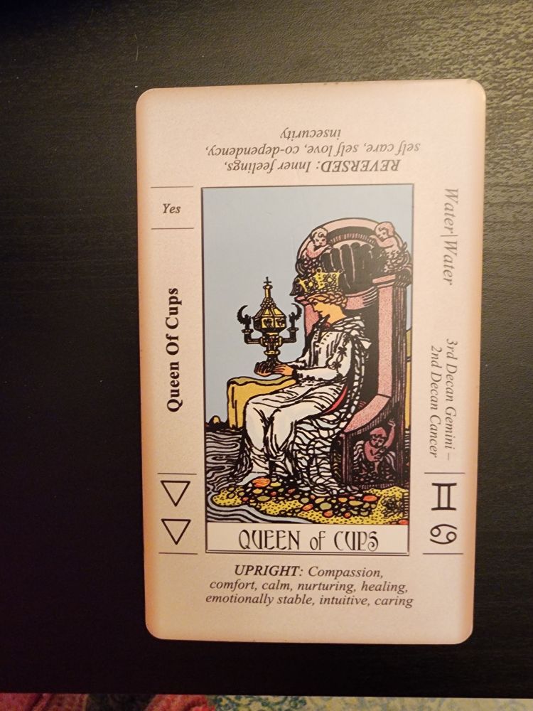 Queen of cups tarot card. Upright: compassion, comfort, calm, nurturing, healing, emotionally stable,  intuitive,  caring. 