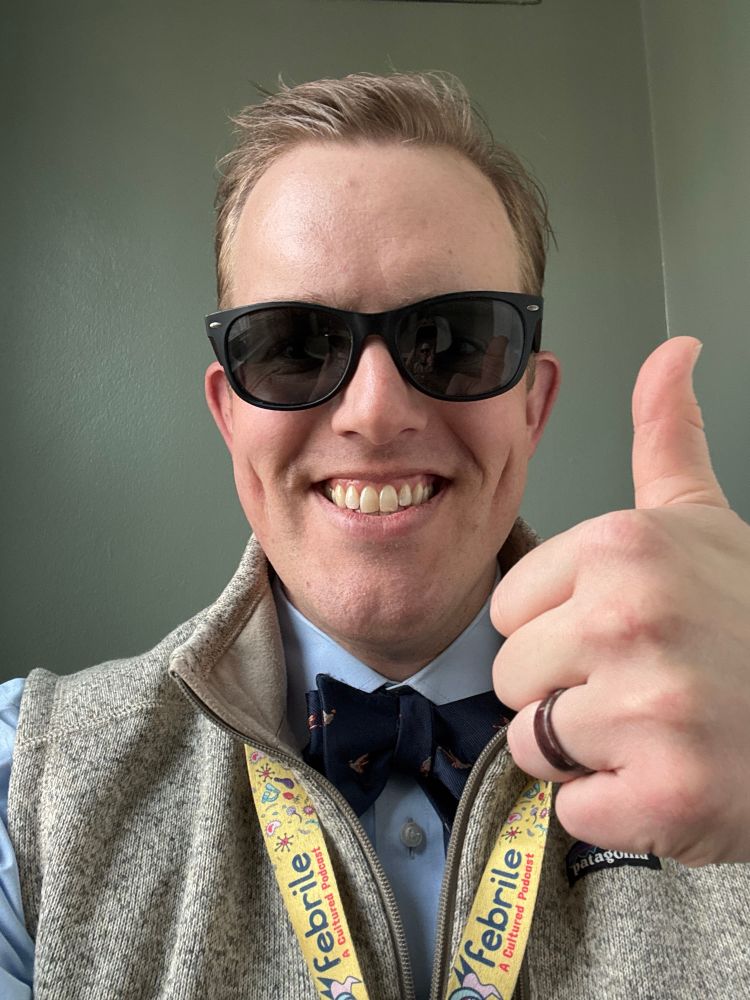 Infectious disease physician attempting to look cool with thumbs up and sunglasses on.