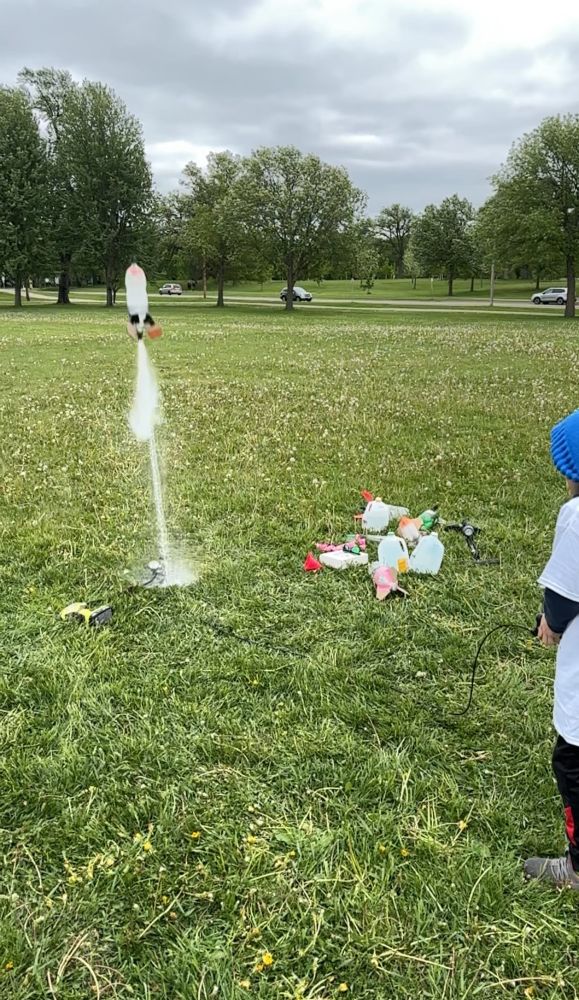 2L soda bottle being launched into the air with water and air pressure