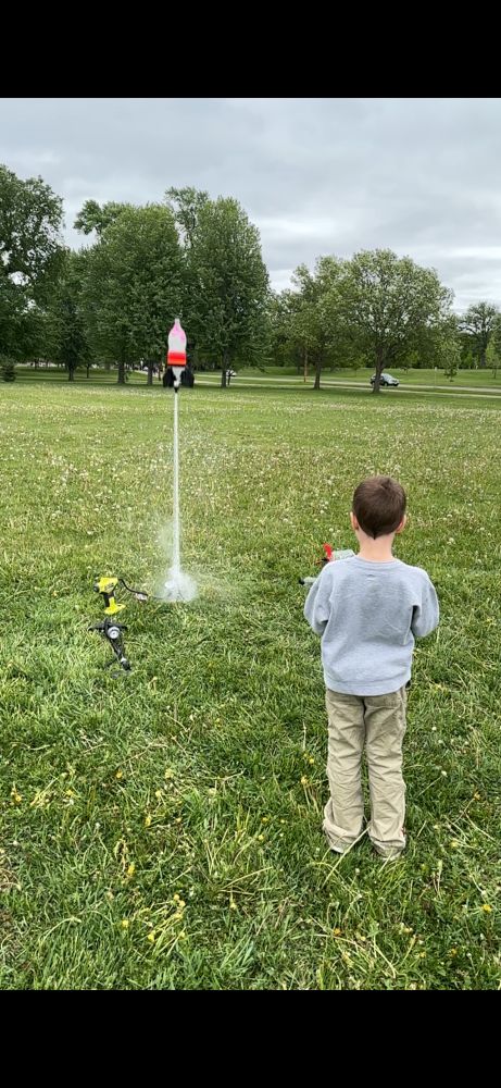 2L soda bottle being launched into the air with water and air pressure