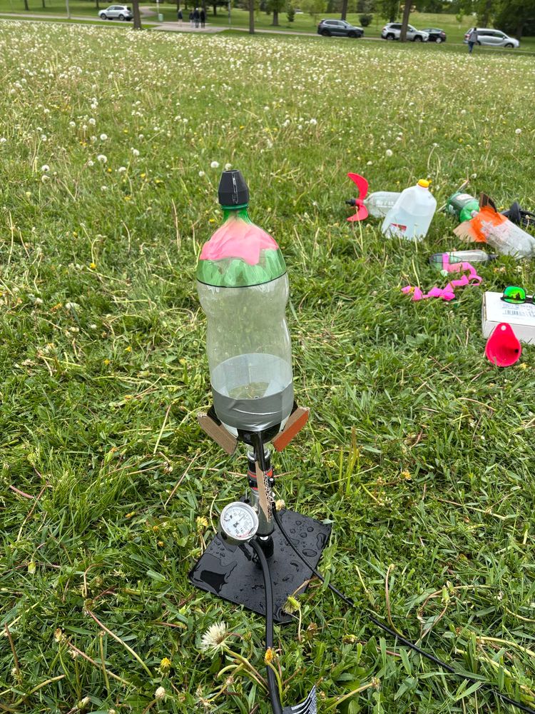 2L soda bottle being launched into the air with water and air pressure