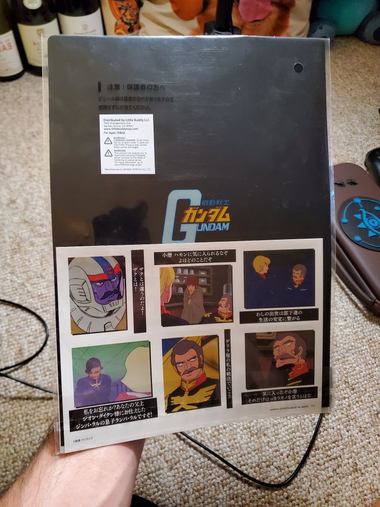 Photograph of a Mobile Suit Gundam and Gundam Seed ichibankuji clear back, showing images of the other web selections - featuring various scenes of Ramba Ral, Hamon, and Amuro from the original Gundam