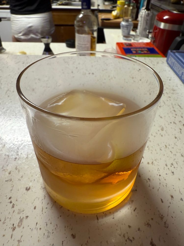 Enjoying my fancy drink while some lil guy dances in the background. 