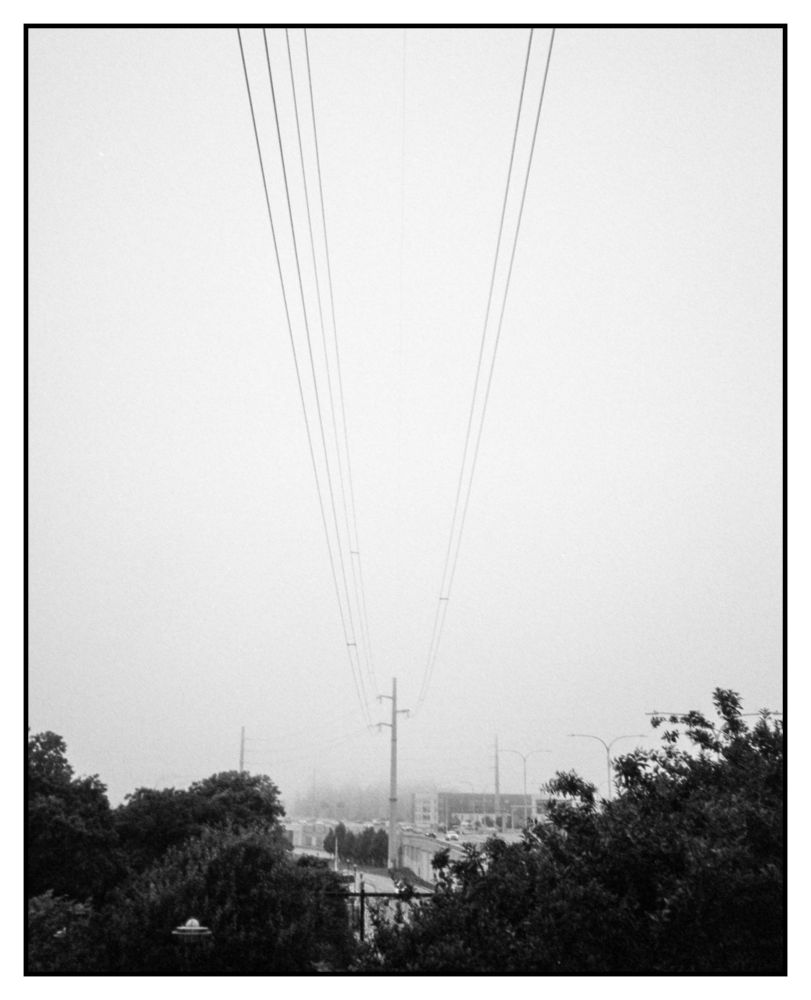 Very subtle overhead power lines heading to/from the power plant hiding in the fog