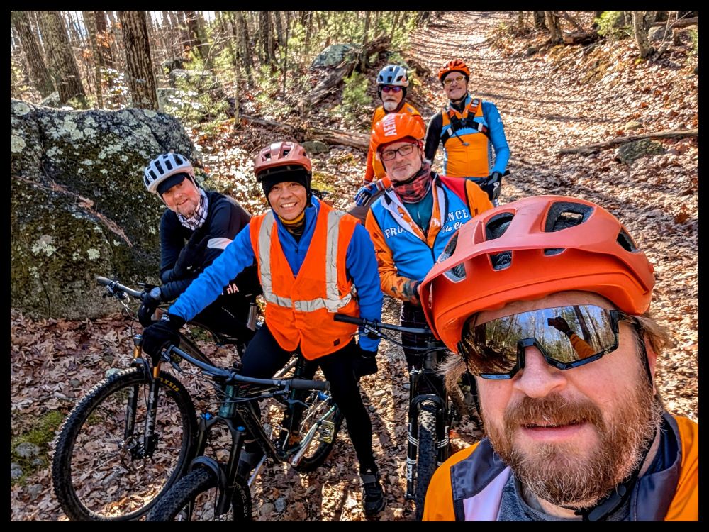 Six old men on mountain bikes all wearing blue and orange (orange is required where we ride) and the one guy visiting from NY didn't get the memo. 