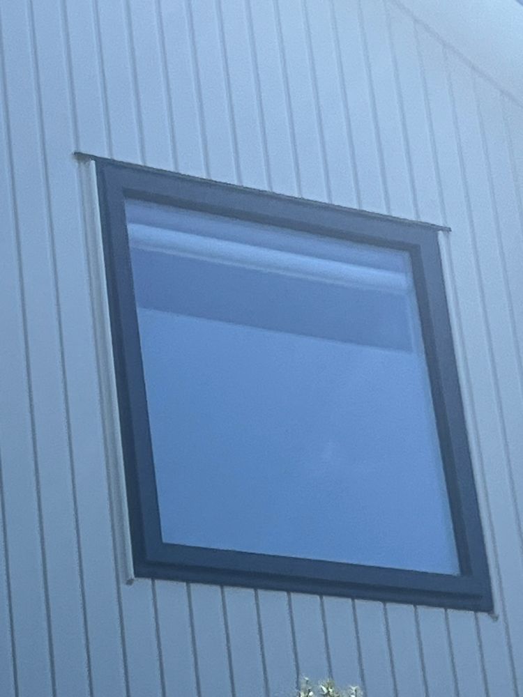 Zoomed in pic of one of the townhouse windows, showing partially frosted window