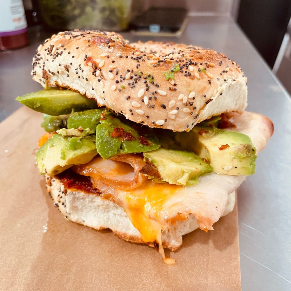 The Cheesy Bird with Avocado on an Everything Bagel at souvenir Cafe San francisco!  