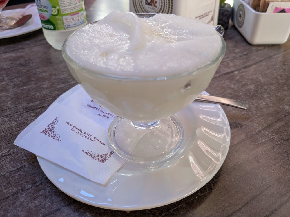 A glass cup of lemon granita