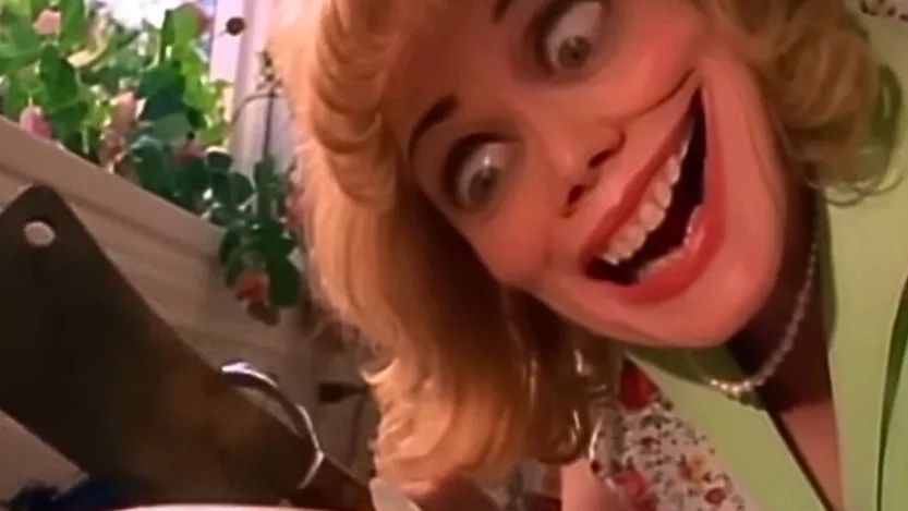 Lady with the demented distorted smile and cleaver from the Soundgarden "Black Hole Sun" video.