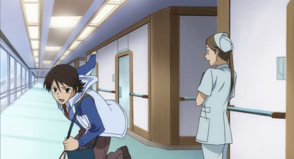 Saji running through a hospital hallway past a nurse