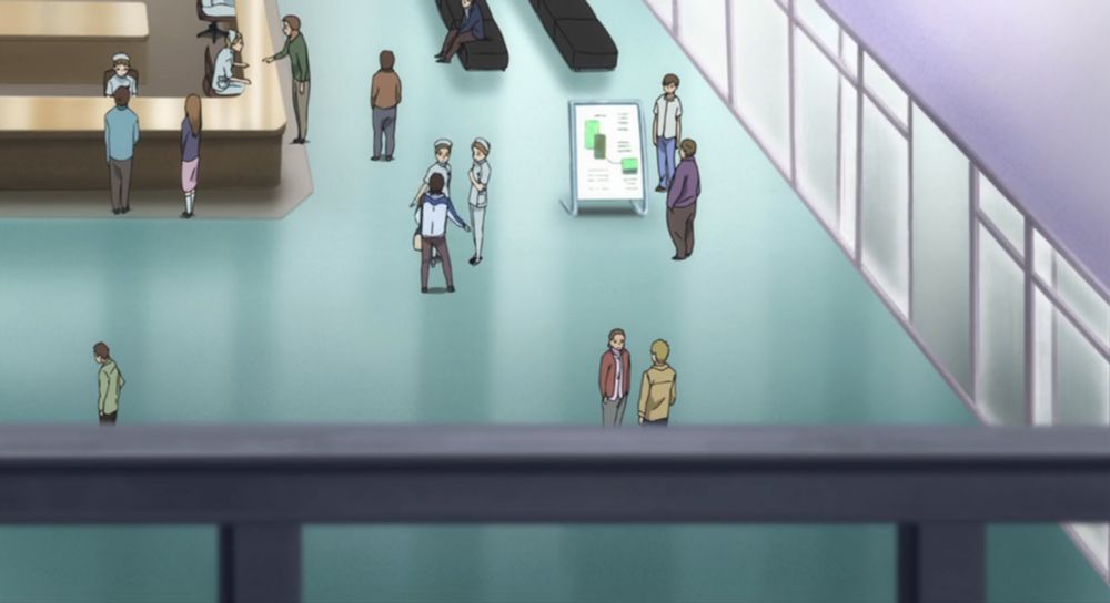 Saji in the hospital reception asking a pair of nurses for directions